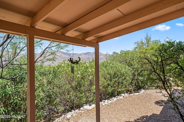 view of patio / terrace featuring a mountain view