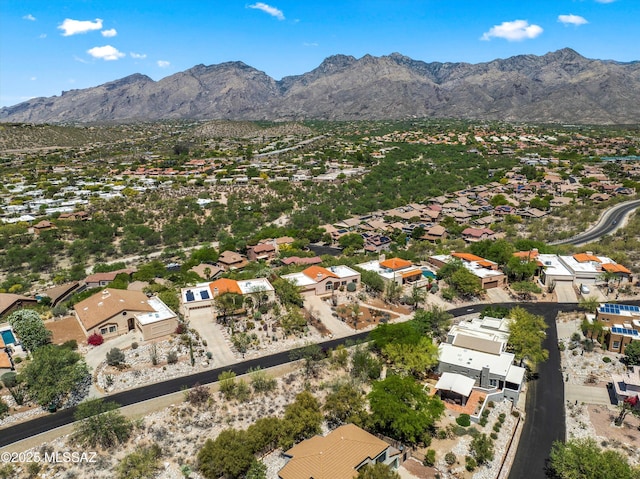 birds eye view of property featuring a mountain view and a residential view