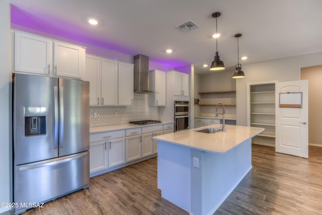 14172 E Vardo Dr, Vail, AZ 85641 - kitchen featuring stainless steel appliances, a sink, wall chimney exhaust hood, light countertops, and recessed lighting