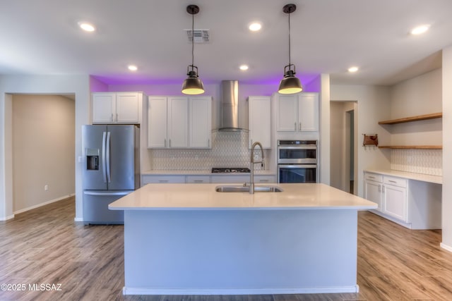 14172 E Vardo Dr, Vail, AZ 85641 - kitchen featuring appliances with stainless steel finishes, wall chimney exhaust hood, open shelves, a sink, and tasteful backsplash