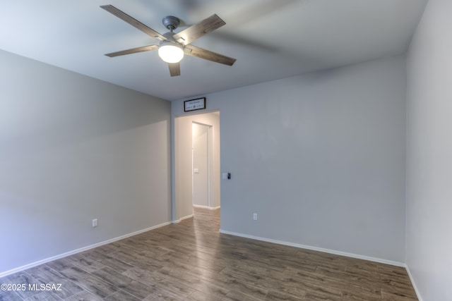 14172 E Vardo Dr, Vail, AZ 85641 - spare room featuring ceiling fan, wood finished floors, and baseboards