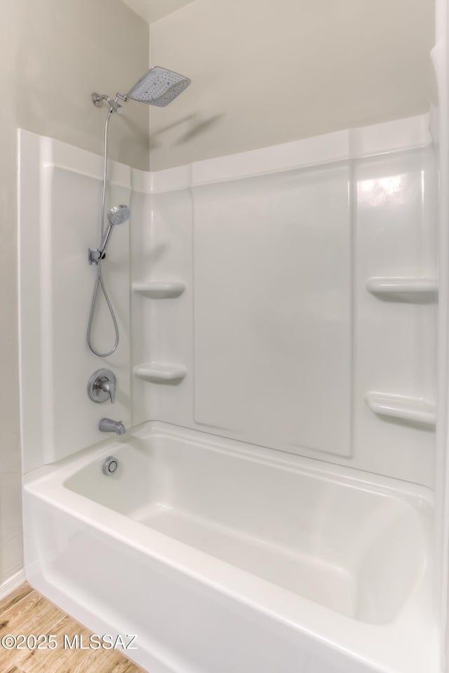 14172 E Vardo Dr, Vail, AZ 85641 - full bathroom featuring wood finished floors and  shower combination
