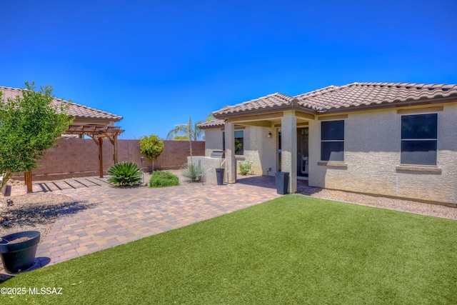 14172 E Vardo Dr, Vail, AZ 85641 - back of house featuring a tiled roof, stucco siding, and a patio