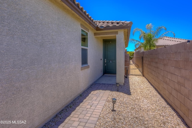 14172 E Vardo Dr, Vail, AZ 85641 - entrance to property with stucco siding, a gate, and a tile roof