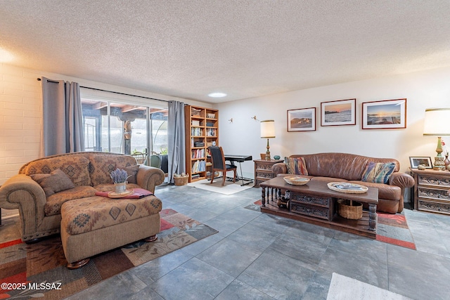 living area with a textured ceiling