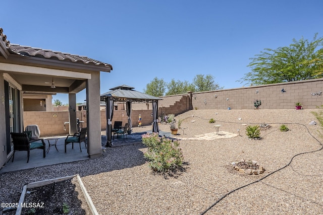 15726 S Camino Oculi, Sahuarita, AZ 85629 - view of yard featuring a gazebo, a fenced backyard, and a patio area