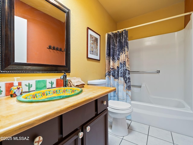 bathroom with tile patterned flooring, shower / bath combo, toilet, and vanity