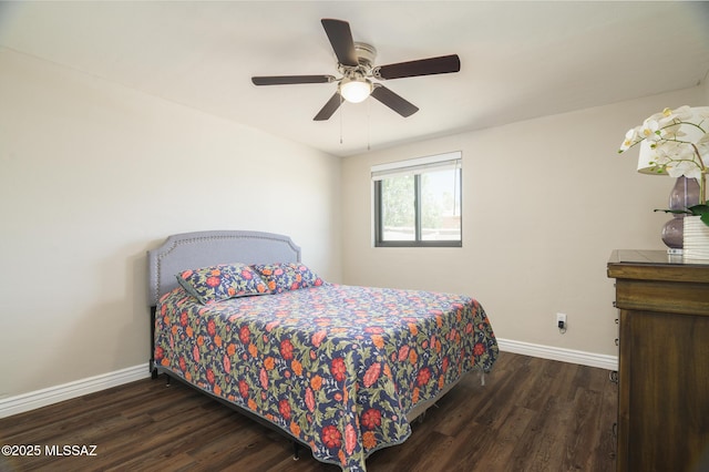 bedroom with baseboards, ceiling fan, and wood finished floors