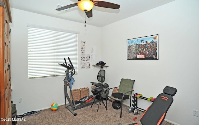workout room with baseboards, carpet flooring, and ceiling fan