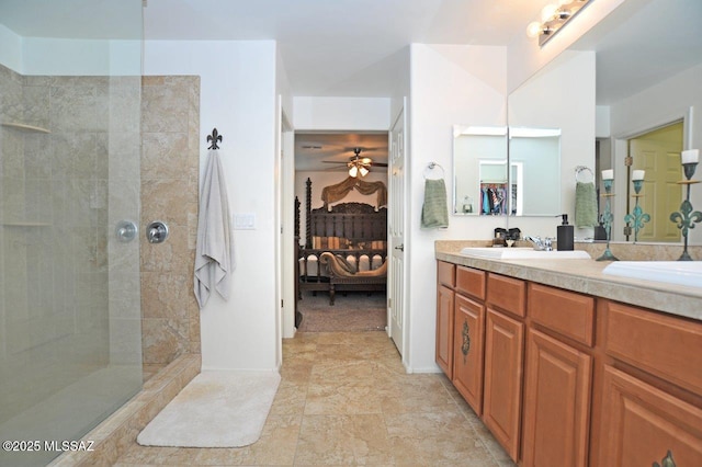ensuite bathroom with double vanity, walk in shower, ceiling fan, a sink, and ensuite bath