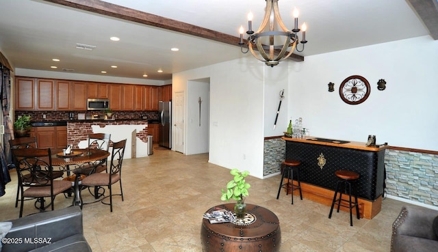 dining area with an inviting chandelier, beamed ceiling, recessed lighting, and visible vents