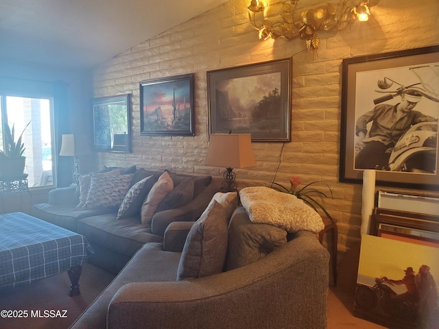 living room featuring lofted ceiling