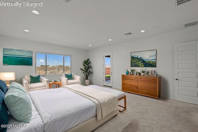 bedroom featuring access to exterior, light colored carpet, and visible vents