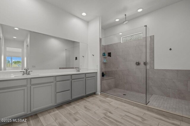 7956 S Desert Indigo Dr, Tucson, AZ 85747 - bathroom with double vanity, walk in shower, and recessed lighting