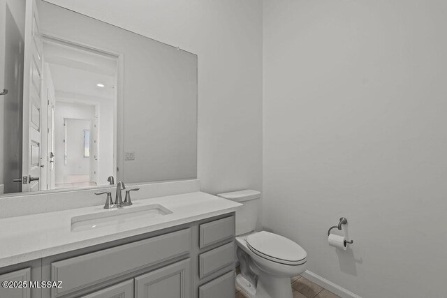 7956 S Desert Indigo Dr, Tucson, AZ 85747 - bathroom featuring toilet and vanity