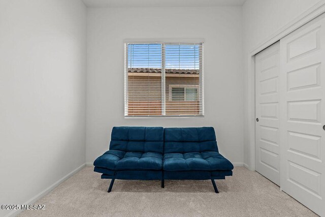 7956 S Desert Indigo Dr, Tucson, AZ 85747 - living area with carpet flooring and baseboards