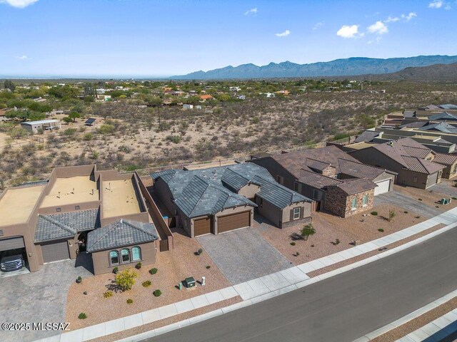 7956 S Desert Indigo Dr, Tucson, AZ 85747 - aerial view of residential area featuring a mountainous background