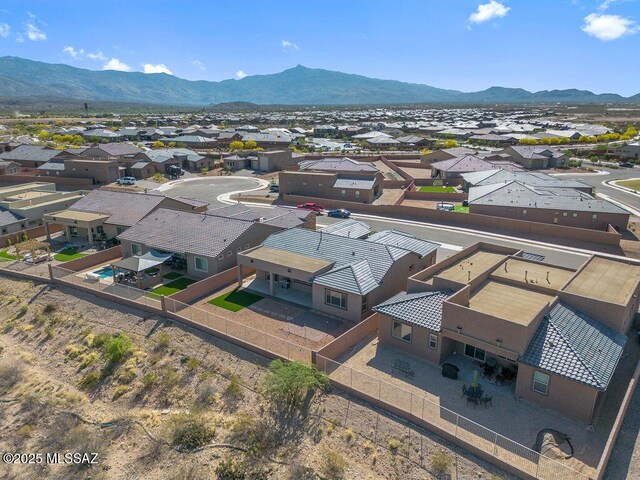 7956 S Desert Indigo Dr, Tucson, AZ 85747 - aerial perspective of suburban area featuring a mountain backdrop