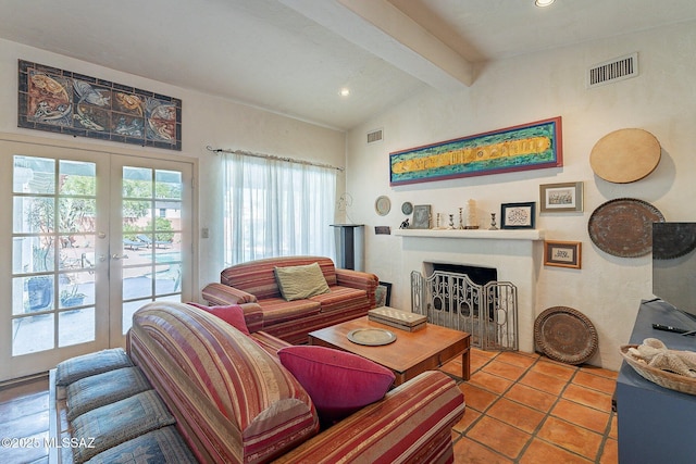 living room featuring visible vents, lofted ceiling with beams, a healthy amount of sunlight, and french doors