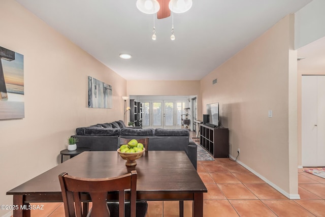 1734 N Van Buren Ave, Tucson, AZ 85712 - dining area featuring baseboards, visible vents, and light tile patterned floors