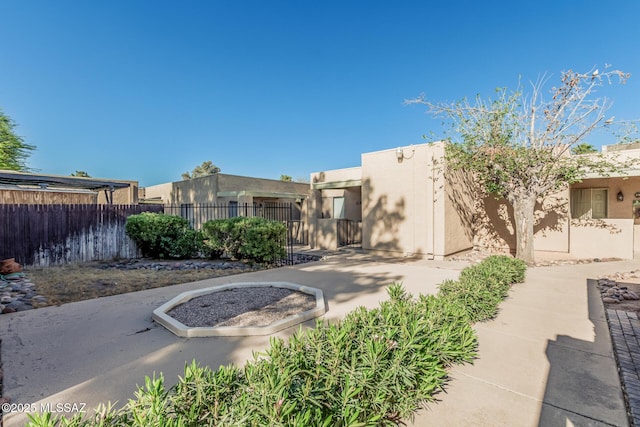 1734 N Van Buren Ave, Tucson, AZ 85712 - view of patio with fence, french doors, and outdoor dining space
