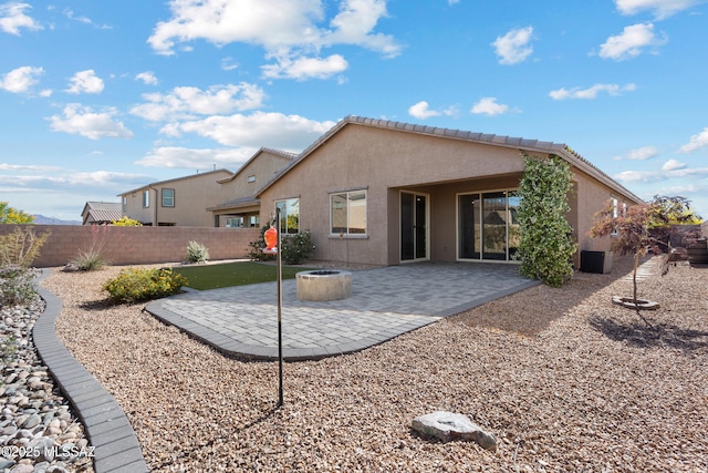 10337 S Pantano Knolls Dr, Vail, AZ 85641 - back of property featuring fence, a patio, and stucco siding