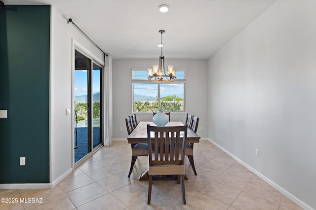10337 S Pantano Knolls Dr, Vail, AZ 85641 - dining room with an inviting chandelier, baseboards, and light tile patterned floors