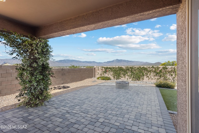 10337 S Pantano Knolls Dr, Vail, AZ 85641 - view of patio / terrace with a fenced backyard and a mountain view