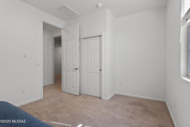 10337 S Pantano Knolls Dr, Vail, AZ 85641 - unfurnished bedroom featuring visible vents, baseboards, carpet floors, and a closet