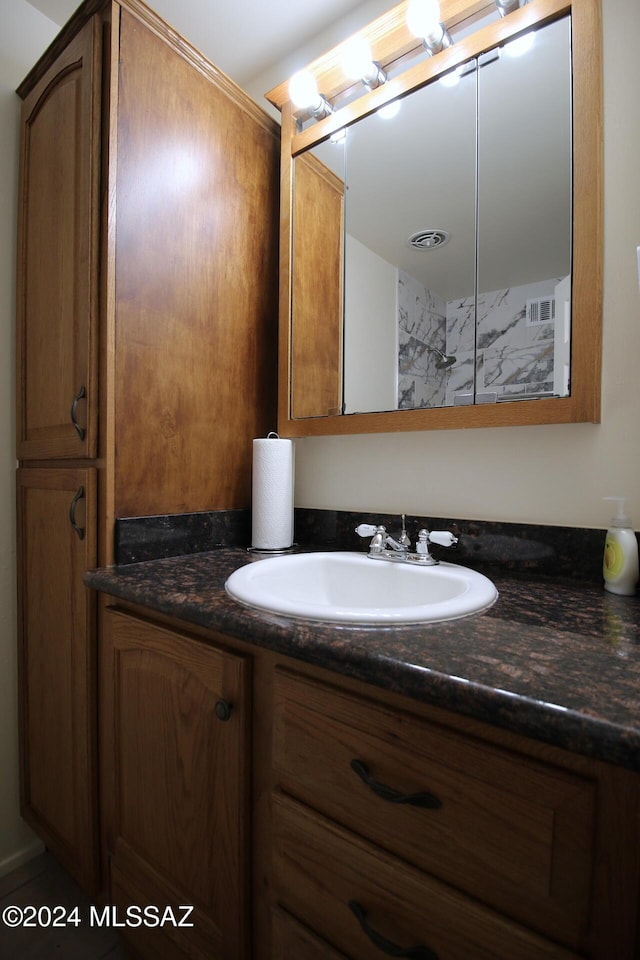 8133 E Colette Pl, Tucson, AZ 85710 - bathroom with vanity and a shower