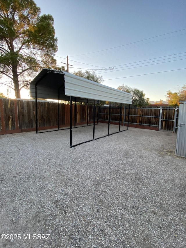 8133 E Colette Pl, Tucson, AZ 85710 - view of yard with fence and a carport