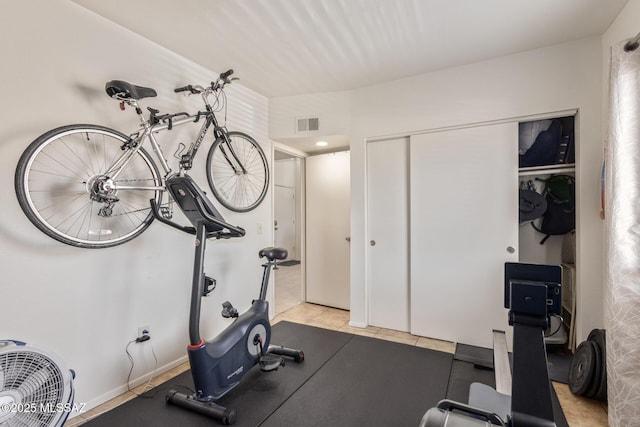 1810 E Blacklidge Dr Apt 827, Tucson, AZ 85719 - workout area featuring light tile patterned floors and visible vents