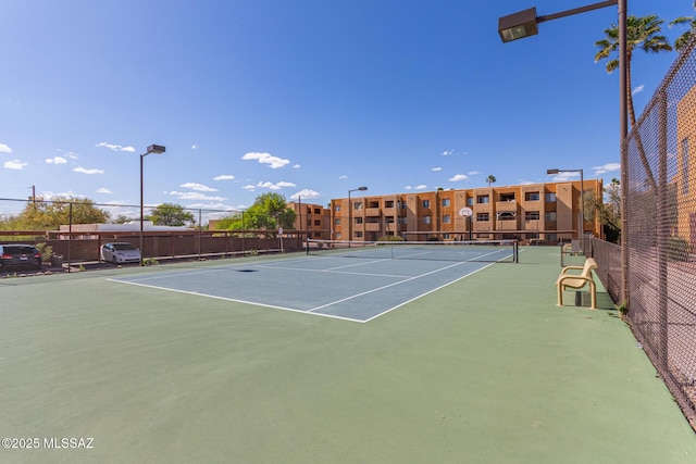 1810 E Blacklidge Dr Apt 827, Tucson, AZ 85719 - view of tennis court with community basketball court and fence
