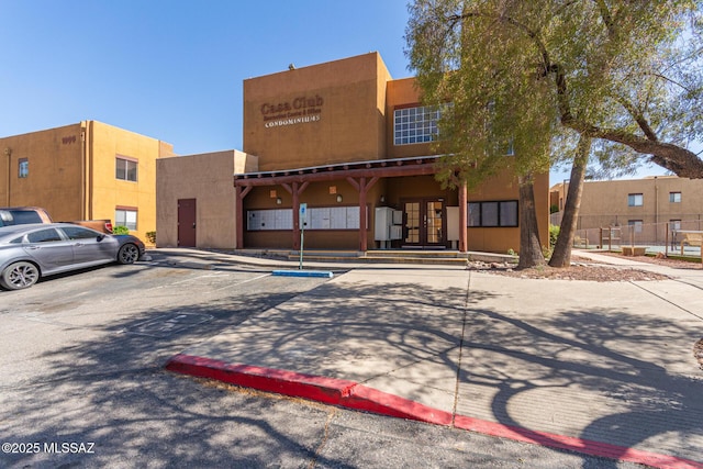 1810 E Blacklidge Dr Apt 827, Tucson, AZ 85719 - view of property with uncovered parking