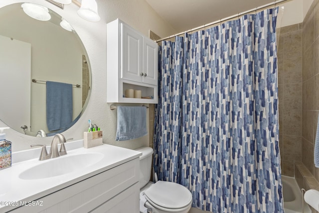 1810 E Blacklidge Dr Apt 827, Tucson, AZ 85719 - full bathroom with toilet, a textured wall, shower / tub combo with curtain, and vanity