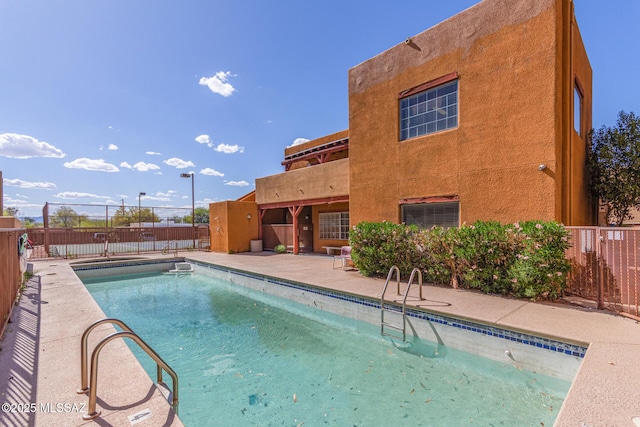 1810 E Blacklidge Dr Apt 827, Tucson, AZ 85719 - community pool featuring a patio and a fenced backyard
