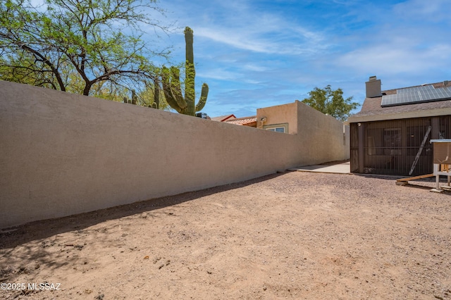 view of yard with fence