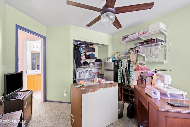 8014 S Wild Primrose Ave, Tucson, AZ 85747 - carpeted office with a ceiling fan