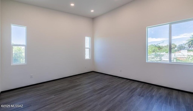 4270 E Broadway Blvd, Tucson, AZ 85711 - spare room featuring recessed lighting, baseboards, a healthy amount of sunlight, and wood finished floors