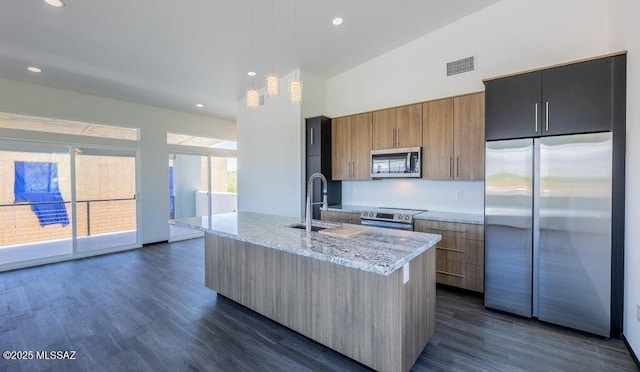 4270 E Broadway Blvd, Tucson, AZ 85711 - kitchen with appliances with stainless steel finishes, dark wood-style floors, a sink, and visible vents