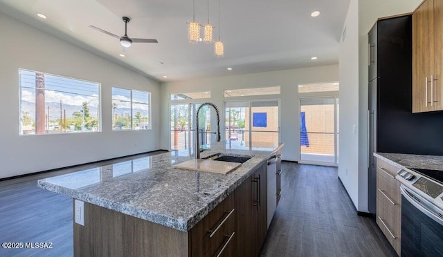 4270 E Broadway Blvd, Tucson, AZ 85711 - kitchen featuring stainless steel appliances, modern cabinets, a sink, and dark wood-type flooring