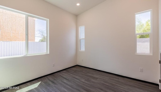 4270 E Broadway Blvd, Tucson, AZ 85711 - spare room with plenty of natural light, recessed lighting, baseboards, and wood finished floors