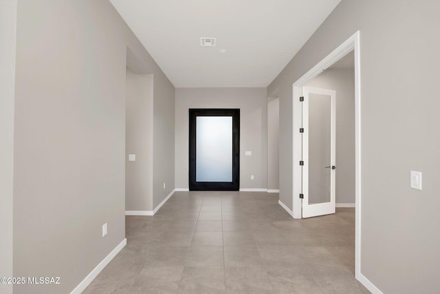 doorway featuring baseboards, french doors, and visible vents