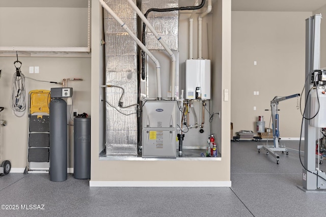 utility room with water heater