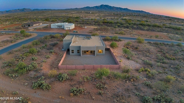 drone / aerial view featuring a mountain view