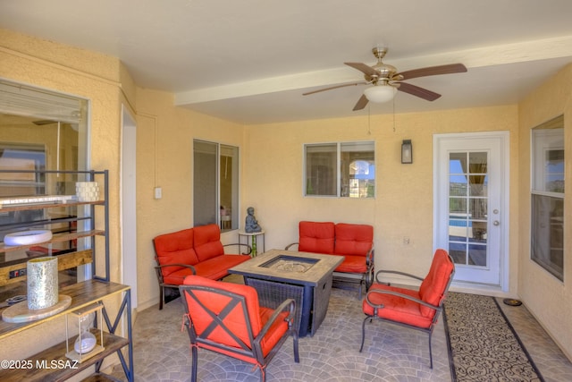 1707 W Sunridge Dr, Tucson, AZ 85704 - view of patio / terrace featuring a ceiling fan and an outdoor living space with a fire pit