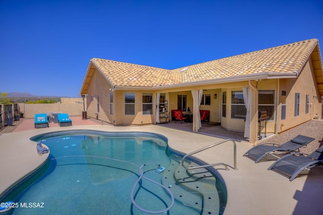 1707 W Sunridge Dr, Tucson, AZ 85704 - view of pool with a fenced in pool, a fenced backyard, and a patio area