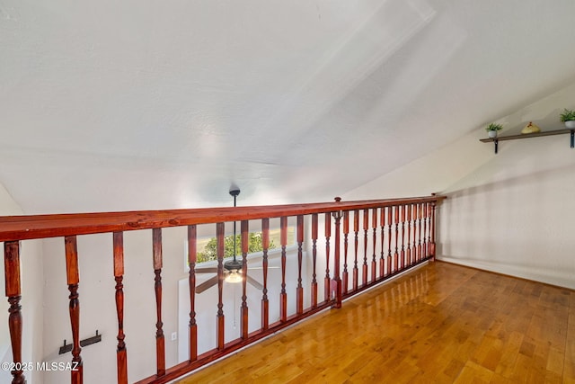 1525 N Bryant Ave, Tucson, AZ 85712 - hall with lofted ceiling and hardwood / wood-style flooring