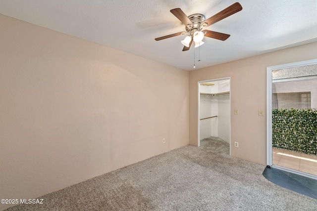 1525 N Bryant Ave, Tucson, AZ 85712 - unfurnished bedroom with ceiling fan, carpet flooring, and a spacious closet