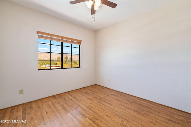1525 N Bryant Ave, Tucson, AZ 85712 - unfurnished room with light wood-type flooring and ceiling fan